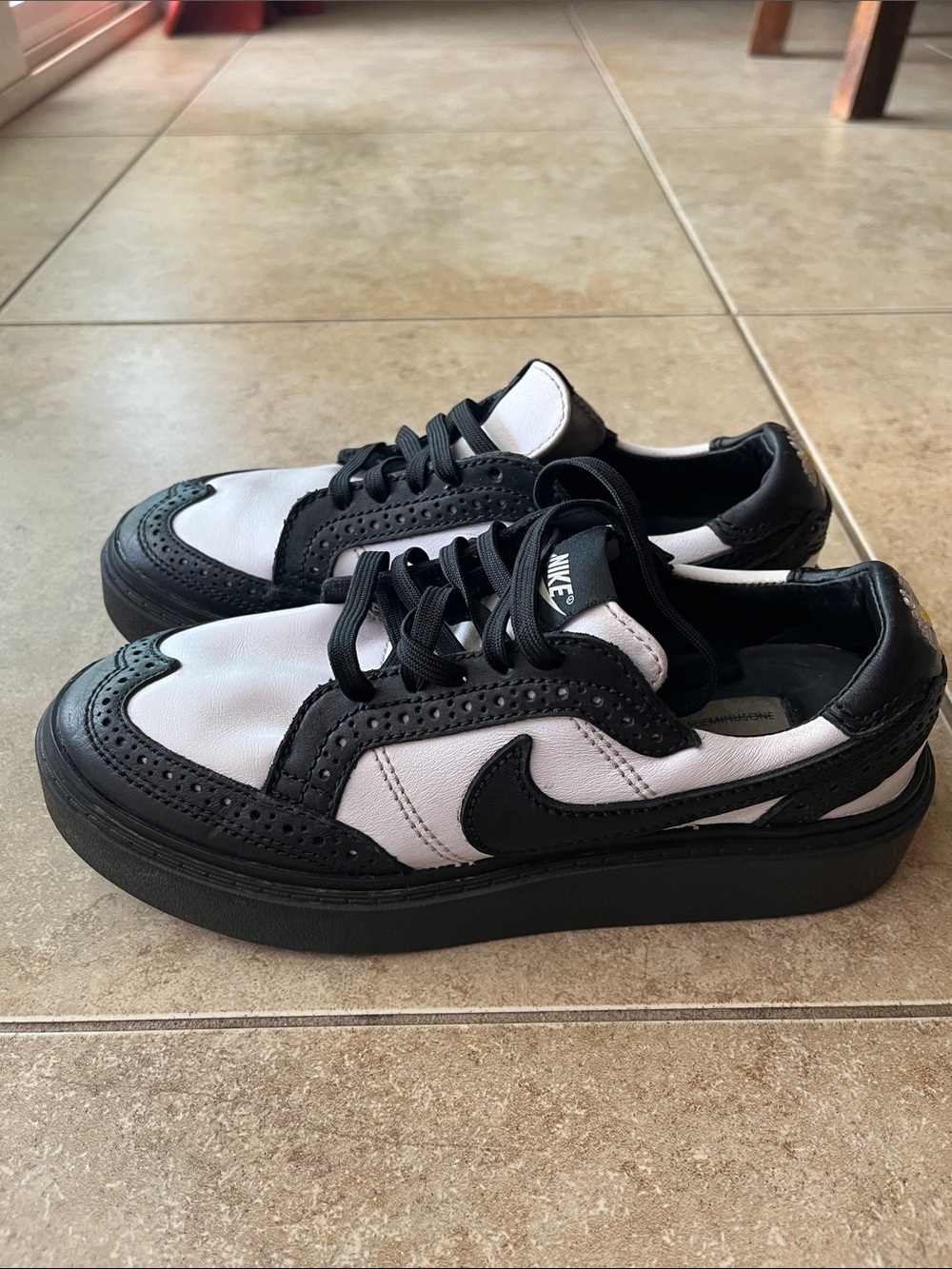 Nike Two-Tone Black and White Brogue-Style Low Tops